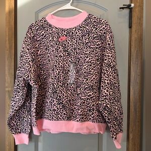 Nike Women's Pink and Black Leopard Sweater